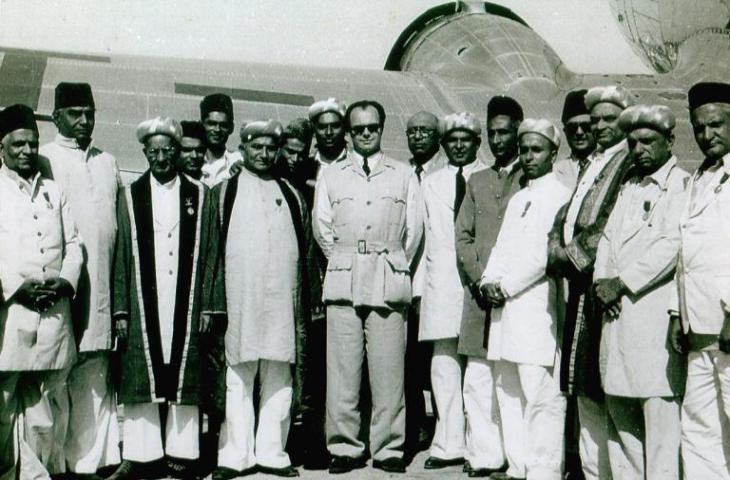 Prince Aly Khan with leaders of the Ismaili Community at Nagpur airport, India. (image credit: Samsu Jalali Collection, Atlanta, Georgia